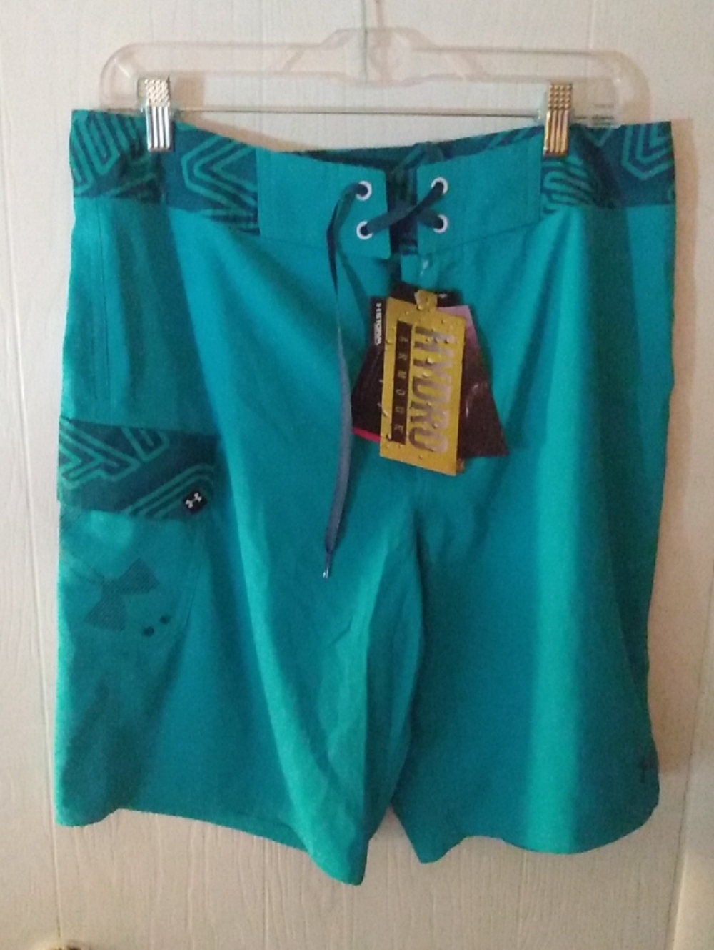 NWT Under Armour Mens 34 Board Shorts Blue Loose Fit Heatgear Swim Trunks